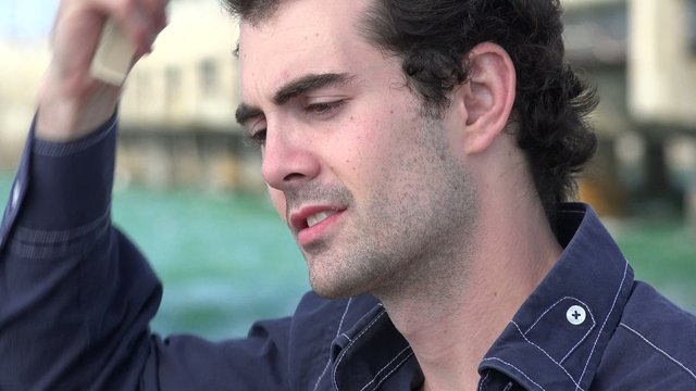 Man Combing Hair