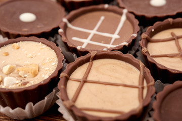 Dark chocolate on wooden background