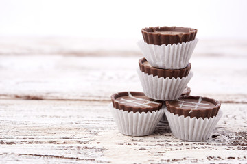 Dark chocolate on wooden background