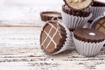 Dark chocolate on wooden background