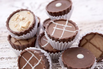 Dark chocolate on wooden background