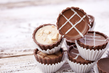 Dark chocolate on wooden background