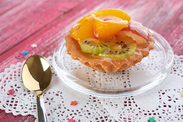 sweet cake with fruits on plate
