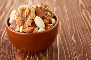 Mix nuts  on wooden background