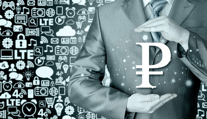 businessman protecting ruble  symbol