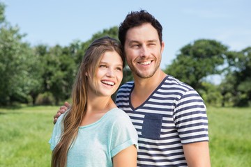 Fototapeta premium Cute couple having fun in park