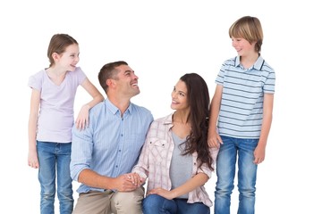 Family smiling while looking at each other