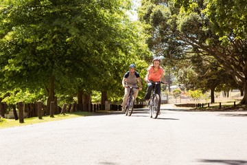 Happy couple on a bike ride