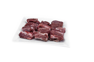 Pork's Short Rips in plate on isolated white background