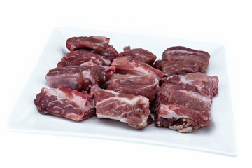 Pork's Short Rips in plate on isolated white background