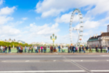 London cityscape with Millennium Wheel, blurred background