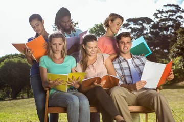 Students studying outside on campus