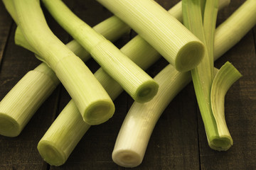 Leeks on a wooden table