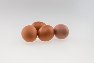 Four eggs. Isolated on white background