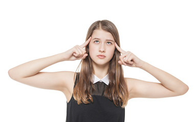 Fototapeta premium Young teenage girl pressed her fingers to the temple isolated