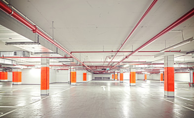 Retro filtered photo of underground car park.