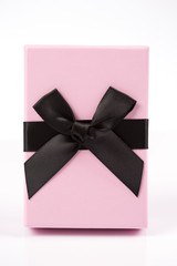 Pink gift box on white background isolated