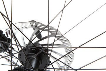 Bicycle wheel with spokes on a white background.