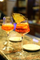 alcohol aperitif with a glass chalice at the bar