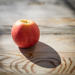 apple on wooden table
