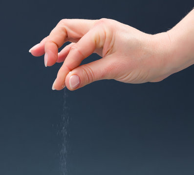 Hand Sprinkling Salt