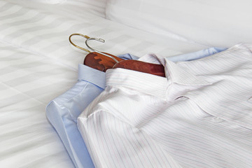 Men's classic shirts on the bed - 79081264