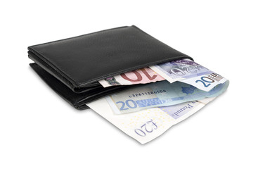 Wallet with euro and pound banknotes with clipping path.