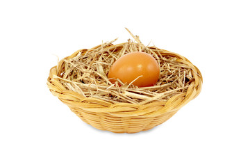 Egg in rattan basket a healthy food gift isolated on white