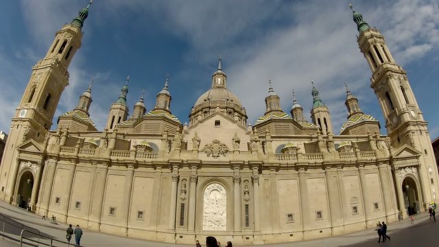 time lapse of curch with towers and sky