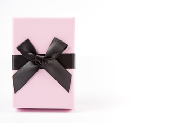 Red and pink gift box on white background isolated