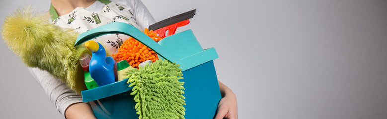 Panoramic photo of woman with bucket