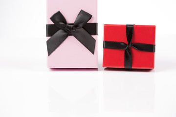 Red and pink gift box on white background isolated