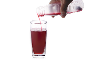 A Glass of roselle juice on white background