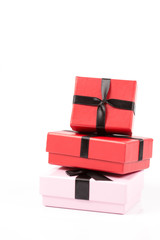 Red and pink gift box on white background isolated