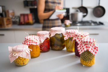 Closeup on jars of pickled vegetables 