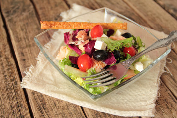Fresh vegetable salad with olives and tomatoes