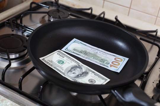 Money in a pan