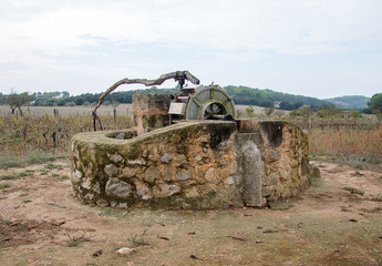 Very old donkey-driven drawing well.