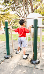 Boy excercise in public park