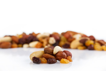 Mix of nuts close up on white