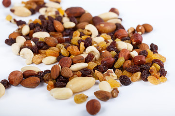 Mix of nuts close up on white