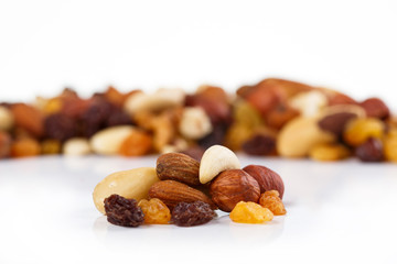Mix of nuts close up on white