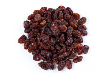 Heap of sultana raisins on white background