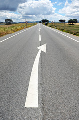 White arrow on the county road