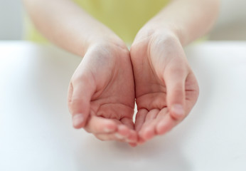 close up of child cupped hands