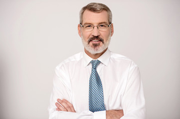 Businessman with folded arms