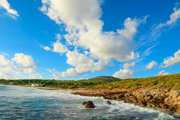 Le bombarde beach under a cloudy sky
