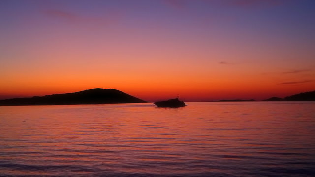 Sunset with yacht