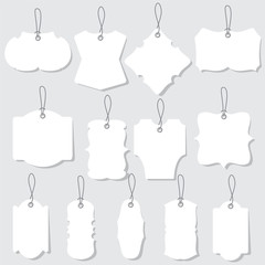 Vector white blank labels or tags with ropes