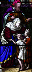 Obraz premium Helping the children in stained glass